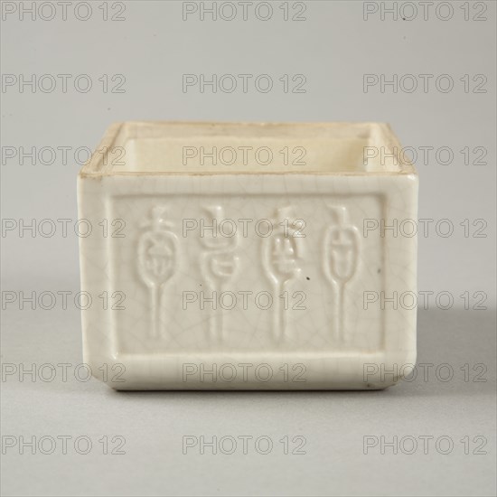 Soft paste rectangular vessel with characters in relief, early 19th century. Artist: Unknown.