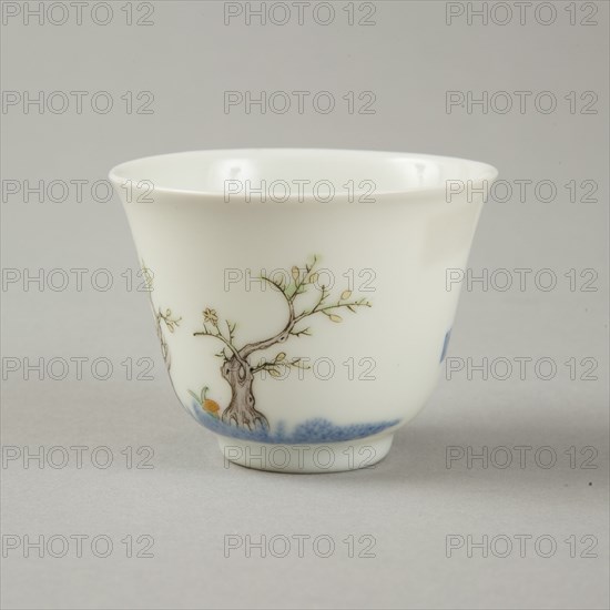 Underglaze blue month cup with polychrome enamelled decoration of a prunus tree. Artist: Unknown.