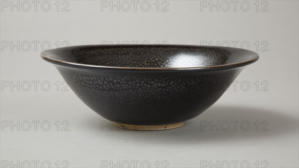 A 20th century copy of buff-bodied Cizhou-type bowl with oil spot glaze, 20th century. Artist: Unknown.