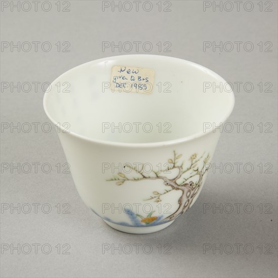 Underglaze blue month cup with polychrome enamelled decoration of a prunus tree. Artist: Unknown.