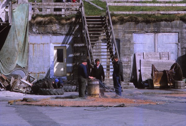 Fishermen in Husavik, Iceland, 20th century. Artist: CM Dixon.