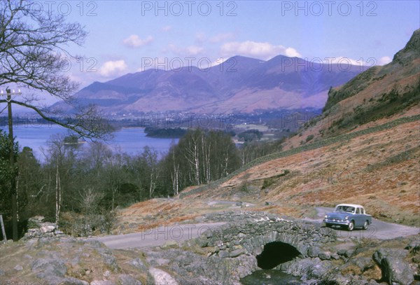 Watendlath Bridge with Derwentwater and Skiddaw Beyond, Lake District, Cumberland, c1960. Artist: CM Dixon.