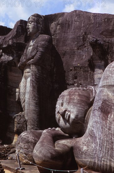 Standing and Reclining Buddha, 12th century, Gal-Vihara, Polonnaruwa, Sri Lanka. (20th century).  Artist: CM Dixon.