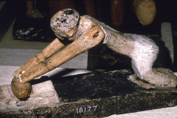 Wood Model of Woman Grinding Corn, Egyptian Tomb Finding, c1900 BC. Artist: Unknown.