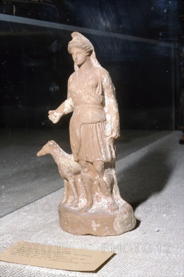 Greek Terracotta, Artemis Bendis with a small hunting dog, c350BC-c300 BC Artist: Unknown.