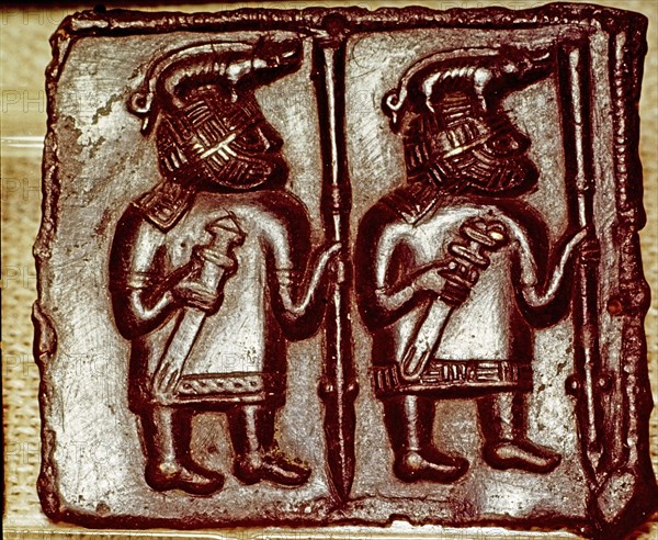 Bronze Matrix for making decorative peaques for helmets, 8th century. Artist: Unknown.