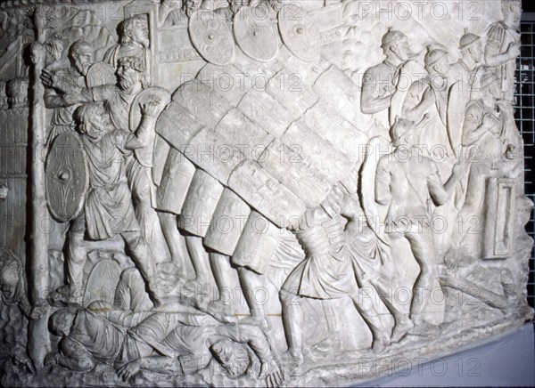 Testudo formation, detail of cast from Trajan's Column, (1st century), c20th century. Artist: Unknown.