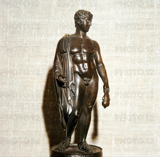 Mercury (Hermes) holding a purse (as bringer of good fortune), Roman, 1st century.  Artist: Unknown.