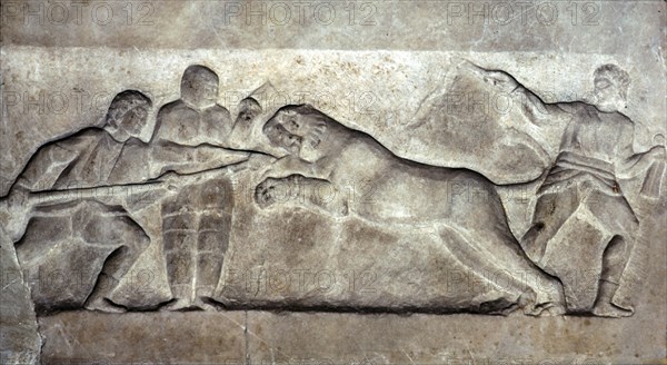 Stone relief ofStone relief of Gladiators fighting a lion, Turkey, c 323BC-31BC Artist: Unknown.