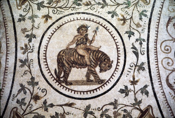 Infant Dionysus Riding on a Tiger, Roman mosaic detail at El Djem, Tunisia. c2nd century.  Artist: Unknown.