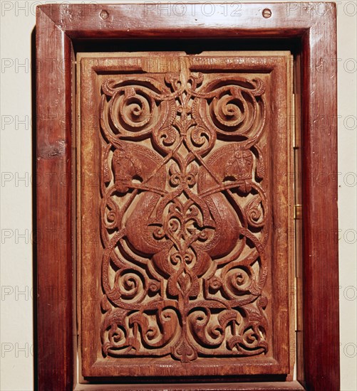 Pair of horses heads on Teak Door-Panel, Egypt, Fatimid Period, 11th century. Artist: Unknown.