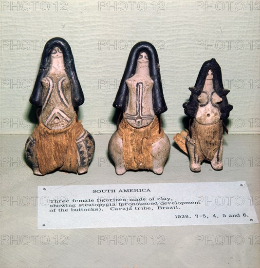 Three Clay Female Fertility figures from Caraja Tribe, Brazil showing Steatopygia Artist: Unknown.