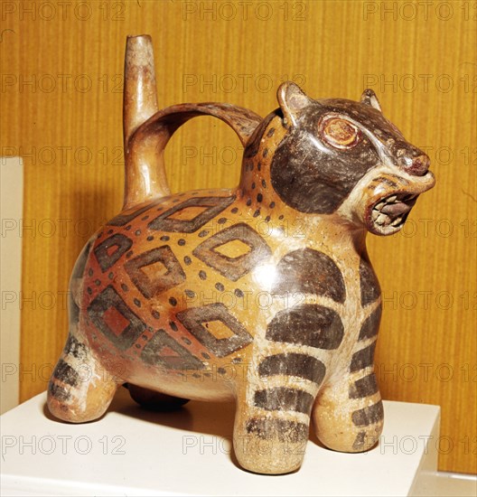 Painted pottery Bridge and Spout vessel in the form of a Jaguar, Tiahuanaco, Peru, 100-600.  Artist: Unknown.