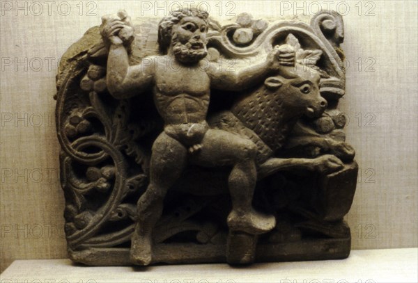 Comic relief, Egyptian Limestone, Herakles and the Cretian Bull, 4th century.  Artist: Unknown.