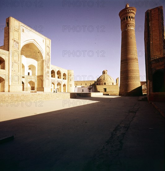 Bukhara, The Kalian Mosque built 15-16th Cnt + Minarfj (1127) Artists: CM Dixon, Unknown.