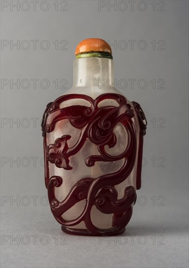 Clear glass snuff bottle with red overlay, China, Qing dynasty, 1644-1911. Creator: Unknown.