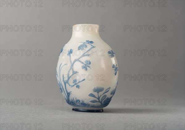 White glass snuff bottle with blue overlay, China, Qing dynasty, 1644-1911. Creator: Unknown.