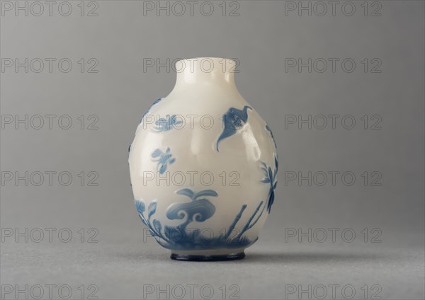 White glass snuff bottle with blue overlay, China, Qing dynasty, 1644-1911. Creator: Unknown.