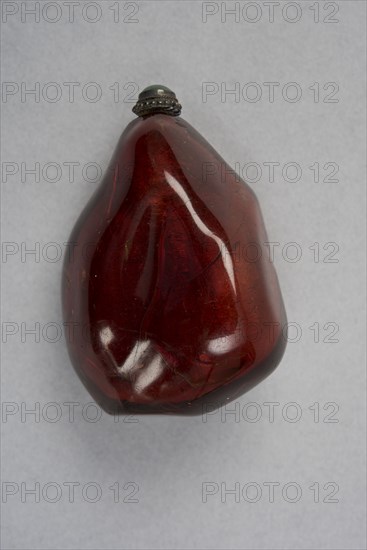 Amber snuff bottle of natural pebble form, China, Qing dynasty, 1644-1911. Creator: Unknown.