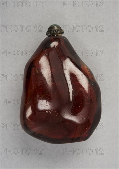 Amber snuff bottle of natural pebble form, China, Qing dynasty, 1644-1911. Creator: Unknown.