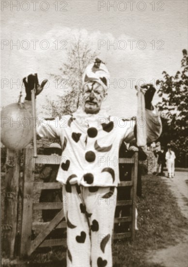 David Edginton as the fool, Oxfordshire, Whit Monday, 5 June 1911. Artist: Cecil Sharp