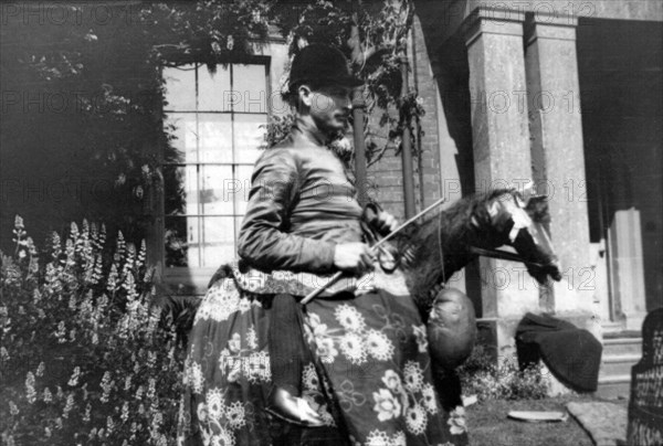 Eli Bennett as the horse, Bidford Morris Dancers, Redditch, Worcestershire, 2 June 1906. Artist: Cecil Sharp