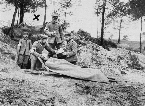 A wounded German soldier at a dressing station, World War I, 1915. Artist: Unknown