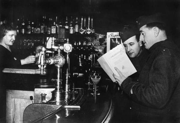 Two French soldiers on leave in a cafe, c1939-1940. Artist: Unknown