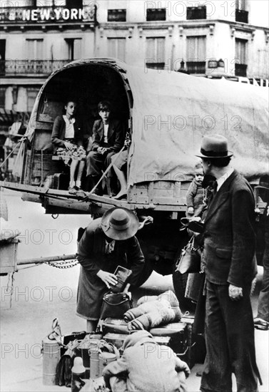 Refugees returning home, Paris, July 1940. Artist: Unknown