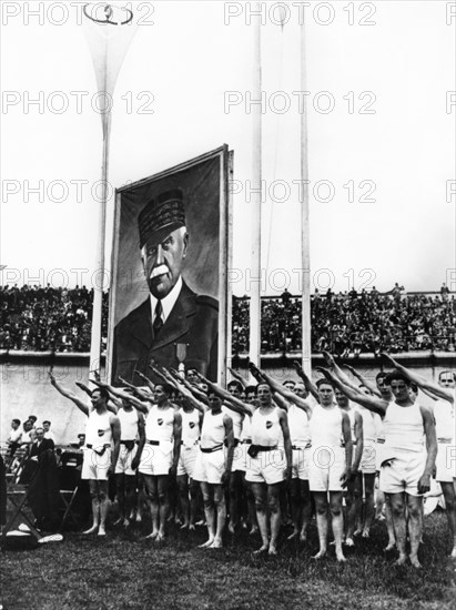 Athletes giving the fascist salute, Parc des Princes, Paris, 1941. Artist: Unknown