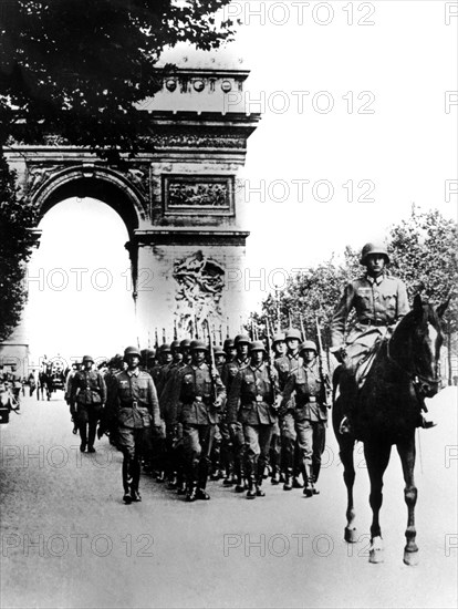German troops marching on the Champs Elysees, Paris, 14 June 1940. Artist: Unknown