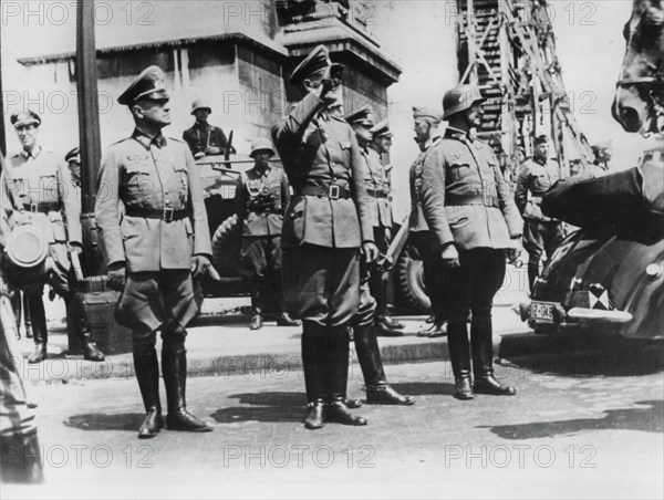 General von Bock saluting German troops parading past the Arc de Triomphe, Paris, 14 June 1940. Artist: Unknown