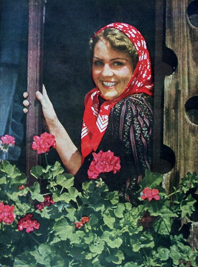 Young German woman at a window, 1943. Artist: Unknown