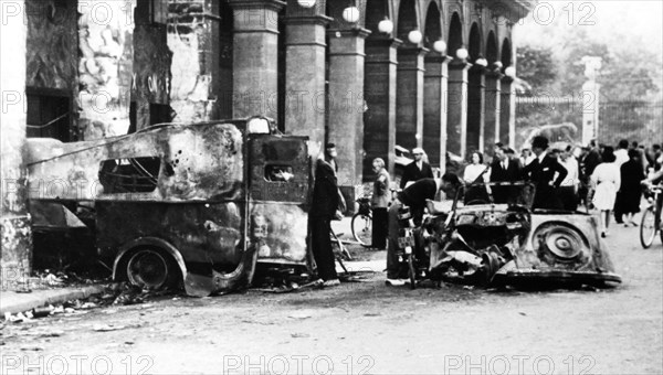 Burned out vehicles in the Rue de Castiglione, liberation of Paris, 25 August 1944. Artist: Unknown