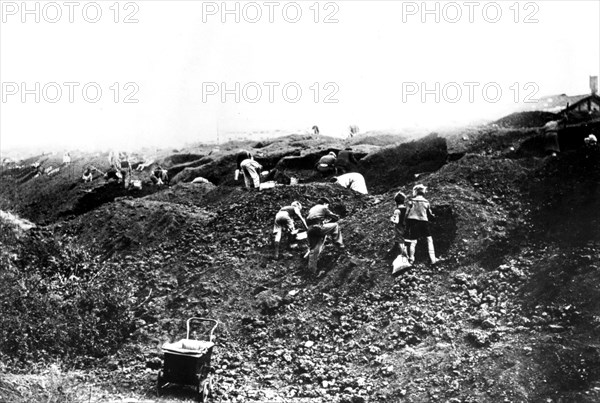 Scavenging for fuel, Argenteuil, German-occupied Paris, September 1940. Artist: Unknown