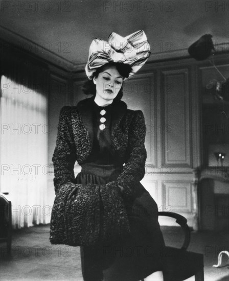 Nina Ricci outfit worn by the fashion model Gabrielle, France, January 1943. Artist: Unknown