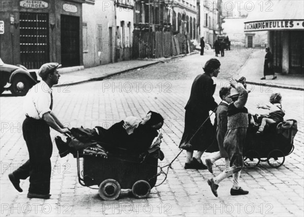 French refugees returning home after the fall of France to the Germans, France, July 1940. Artist: Unknown