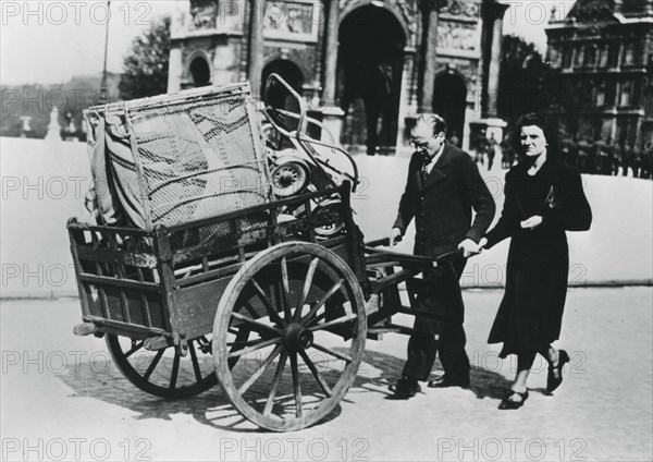 French refugees returning home after the fall of France to the Germans, Paris, July 1940. Artist: Unknown