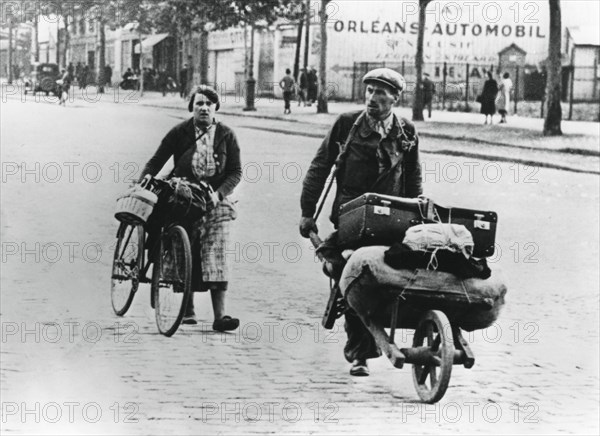 French refugees returning home after the fall of France to the Germans, Paris, July 1940. Artist: Unknown
