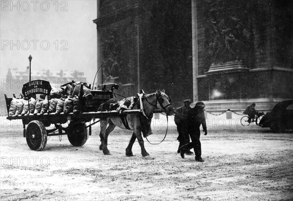 A cartload of scarce coal, occupied Paris, January 1941. Artist: Unknown