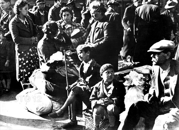 Belgian refugees with their bicycles and possessions outside the Gare du Nord, Paris, July 1940. Artist: Unknown