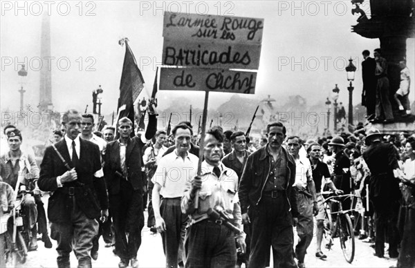 Members of the Resistance marching on the Place de la Concorde, liberation of Paris, August 1944. Artist: Unknown