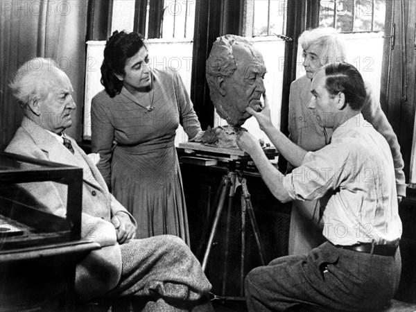 Arno Breker, German sculptor, working on a bust of Gerhart Hauptmann, 26 October 1942. Artist: Unknown