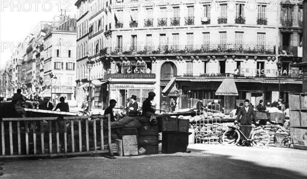 Barricade on the Rue de Chateaudun, liberation of Paris, August 1944. Artist: Unknown