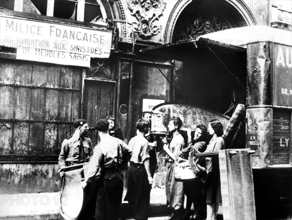 Distributing furniture confiscated from Jews to victims of Allied bombing, Paris, 1943-1944. Artist: Unknown