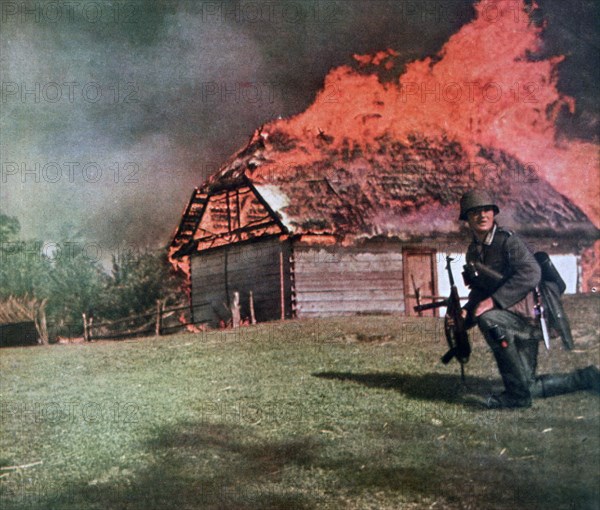 'Through the curtain of flame German observers move forward', Russia, 1941. Artist: Unknown