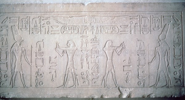 Lintel of Senusret III depicting the Pharaoh making offerings to the God Montu, 12th Dynasty. Artist: Unknown