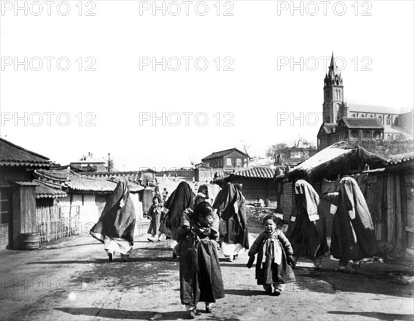 Women and children, Nam San, Korea, 1900. Artist: Unknown