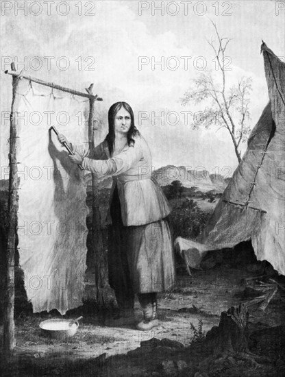 'Indian Woman Dressing a Deer Skin', 1868.Artist: Seth Eastman