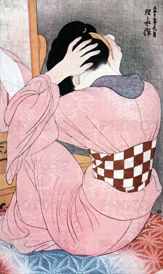 'A Girl Dressing her Hair', or, 'Woman with an Undersash', c1921.Artist: Ito Shinsui
